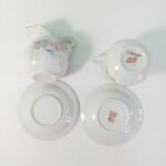 Συλλεκτικά πιατάκια και γαλατιέρες από πορσελάνη σε σχέδια ροζ και γαλάζιων λουλουδιών (Satsuma/Poland/Romania) (4 τεμάχια) - Image 4