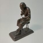 Γλυπτό από ρεγκούλ που απεικονίζει τον "Hans Sachs" ως υποδηματοποιό